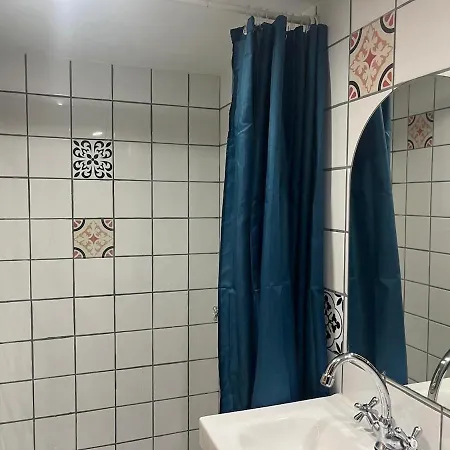 Apartment Charming Studio, Ecusson